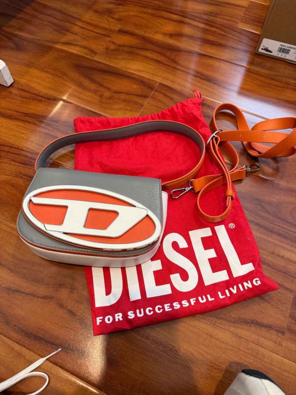 Diesel Leather Crossbody with Orange Oval Logo and Gray Body